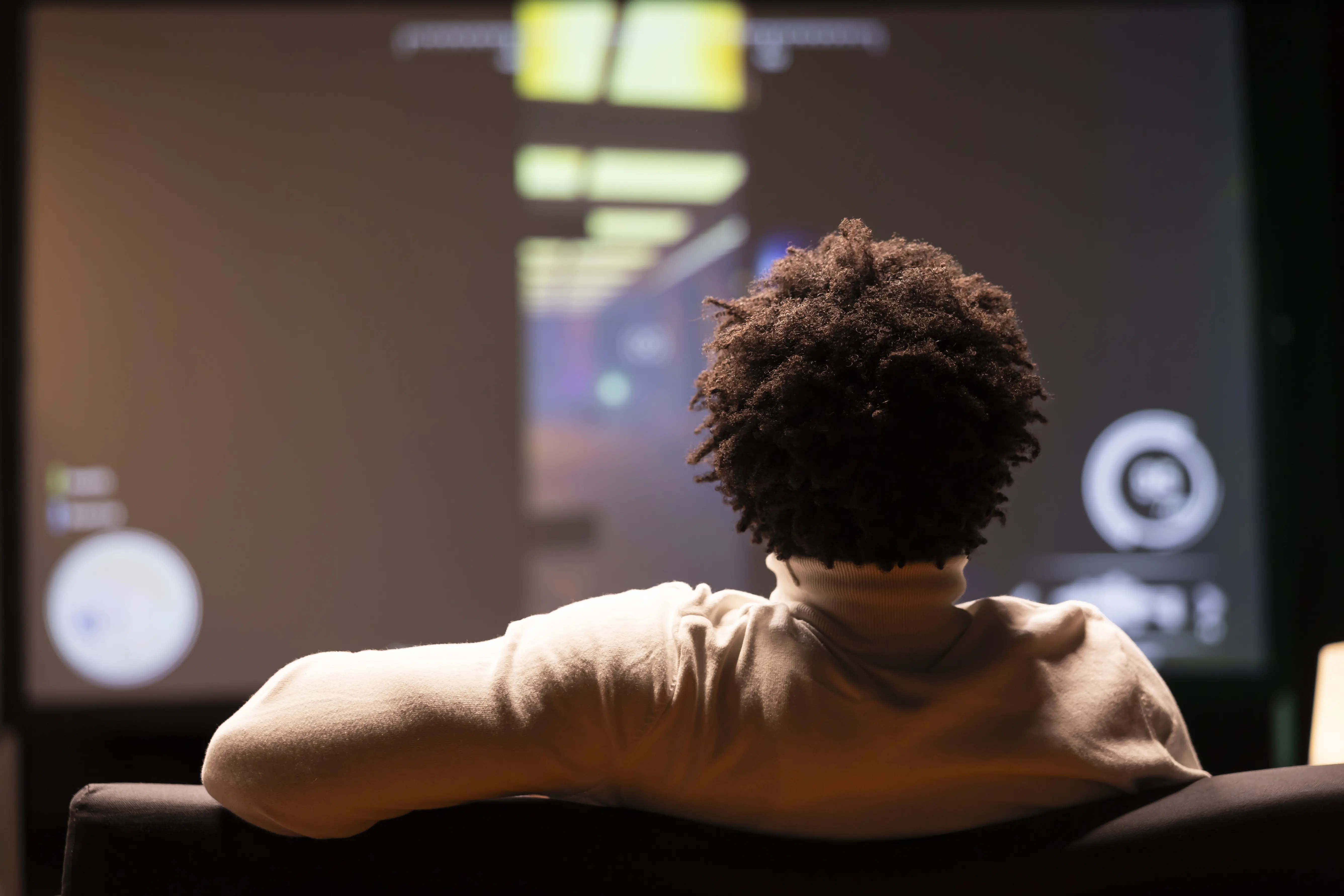 Man reviewing high-definition video surveillance footage