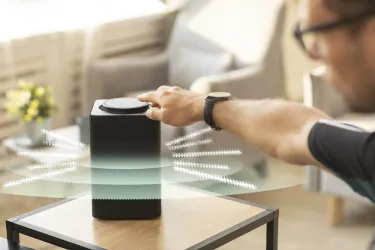 Man using speaker for environmental detection